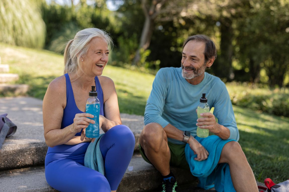 athletic couple smiling